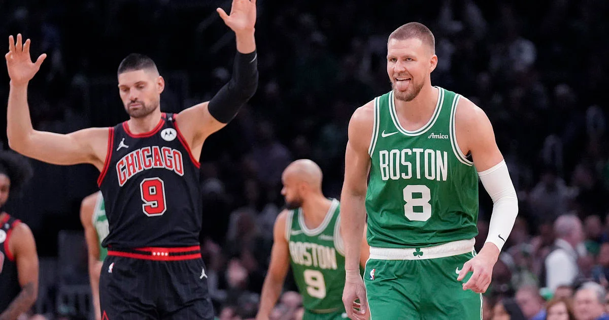 Kristaps Porzingis scores 34 points, Celtics beat Bulls 122-100
