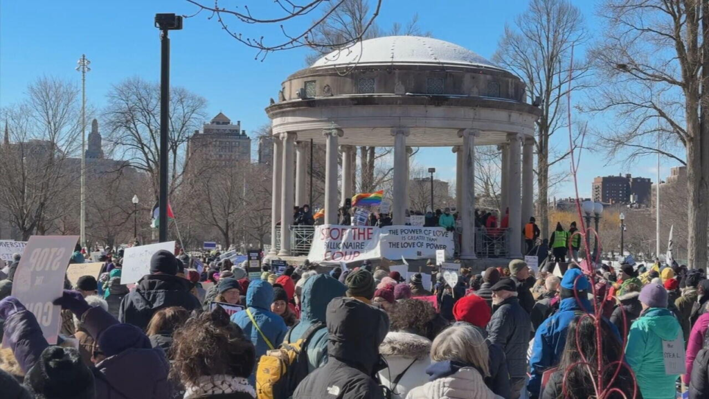 People gather to protest the policies of President Donald Trump's administration on Friday, Feb. 14, 2025 in Boston.