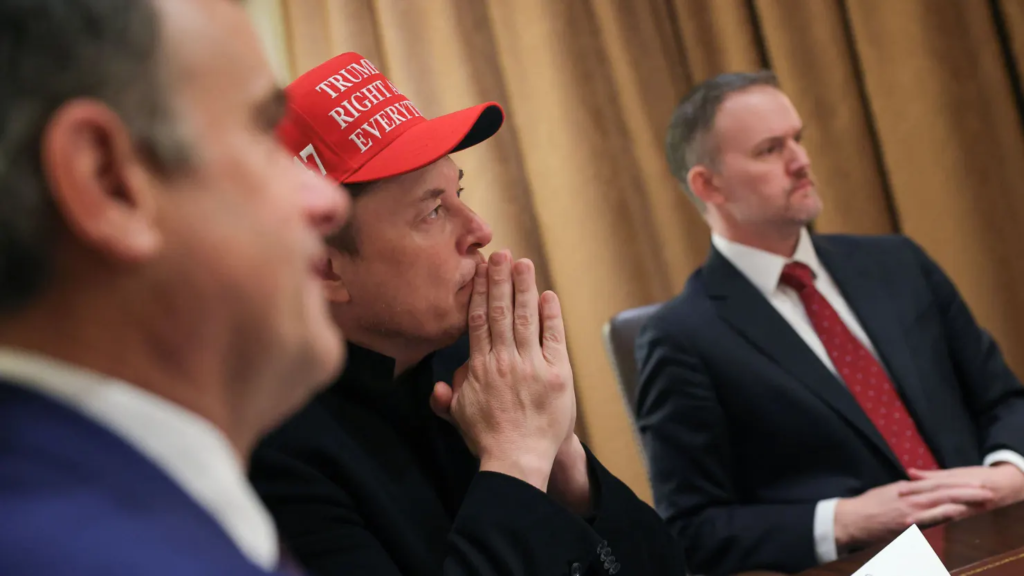 Tesla CEO Elon Musk wears a ‘Trump Was Right About Everything!’ hat, as he, U.S. Trade Representative Jamieson Greer and Central Intelligence Agency Director John Ratcliffe attend a cabinet meeting at the White House