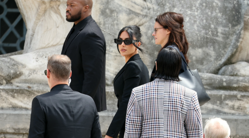 Kim Kardashian, center, arrives at the Assize Court for the trial over the 2016 robbery, in Paris, France, May 13, 2025.
