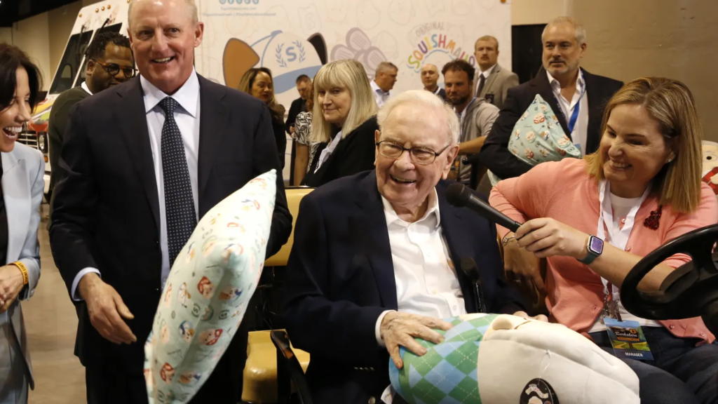 Warren Buffett and Greg Abel walkthrough the Berkshire Hathaway Annual Shareholders Meeting in Omaha, Nebraska.