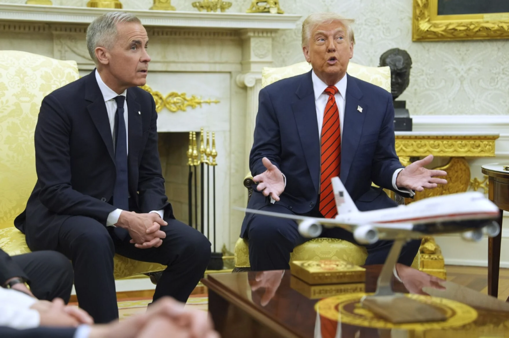 President Donald Trump meets Canadian Prime Minister Mark Carney in the Oval Office of the White House, Tuesday, May 6, 2025, in Washington.