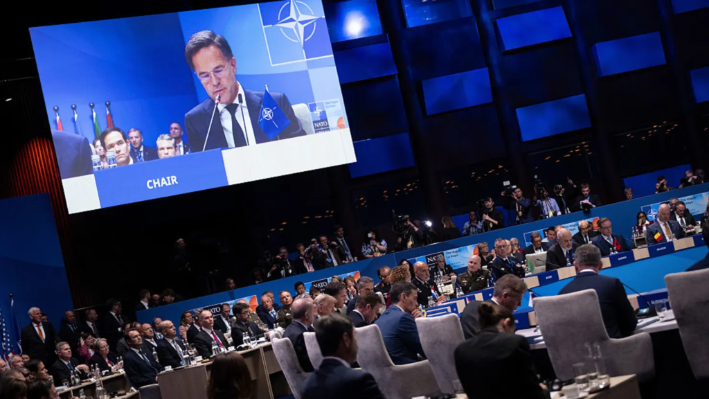 (Article image: NATO Secretary General Mark Rutte addresses alliance leaders during the North Atlantic Council Plenary Session at the 2025 NATO Summit in The Hague. Photo by Brendan Smialowski - Pool/Getty Images)