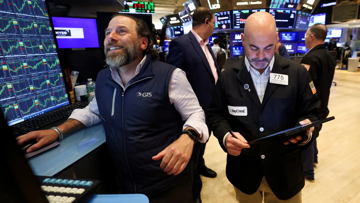 S&P 500 closes at a record Friday, overcoming even more trade angst