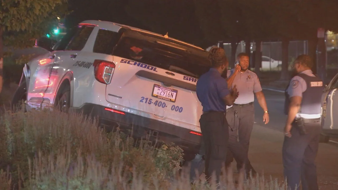 School police officer shot while trying to help road rage victim, police say