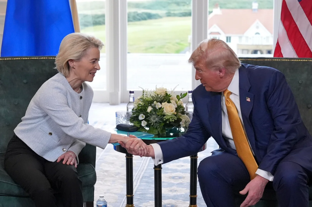President Trump shakes hands with European Commission President Ursula von der Leyen as they meet at the Trump Turnberry golf course in Turnberry, Scotland, Sunday, July 27, 2025.
Jacquelyn Martin / AP
