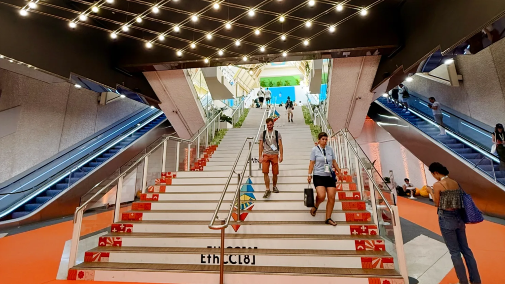 Inside the Palais des Festivals, ETHCC draws founders, developers, and institutions into the same halls that host the world’s biggest film premieres — this time, for the future of finance. MacKenzie Sigalos