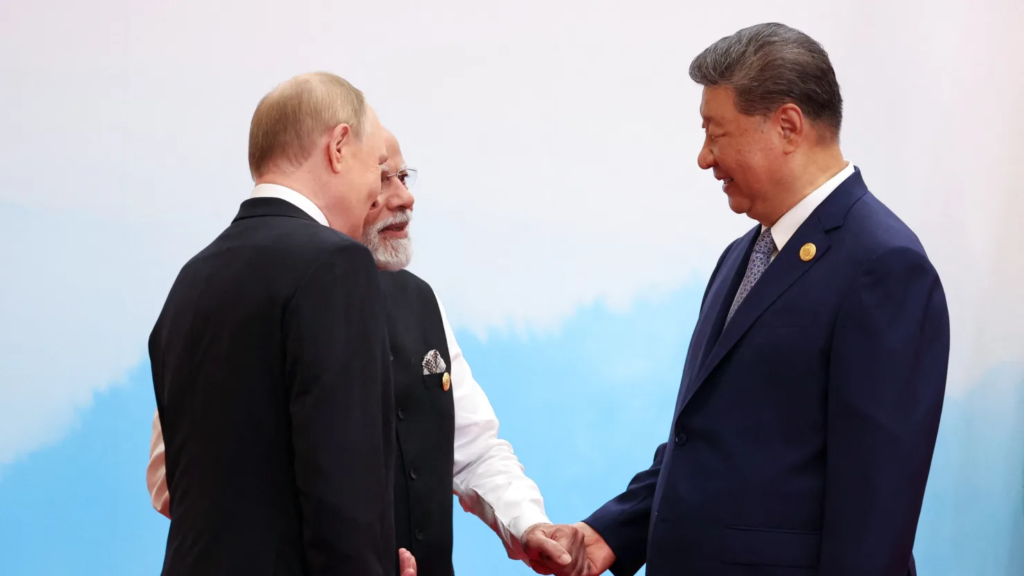 Russia’s President Vladimir Putin (front L) speaks with India’s Prime Minister Narendra Modi (C) and China’s President Xi Jinping during the Shanghai Cooperation Organisation (SCO) Summit in Tianjin on September 1, 2025. Alexander Kazakov