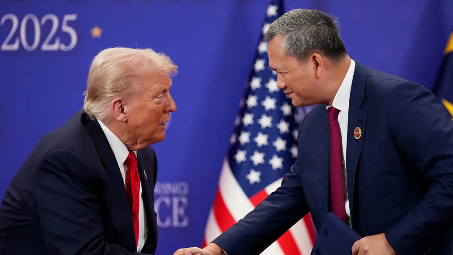 Trump travels to Asia to meet China's Xi, as government shutdown continues