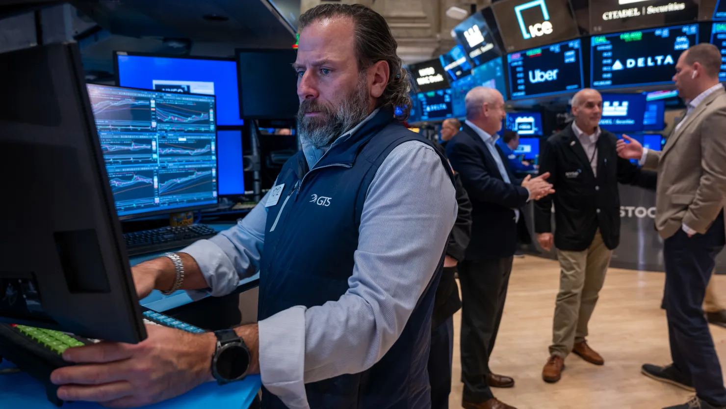 Stocks fall, Dow pulls back from record high