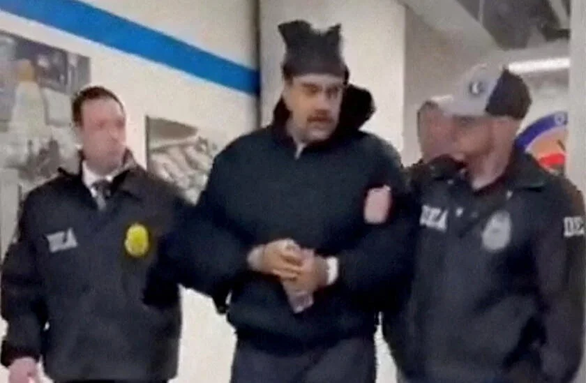 A still image from video posted by the White House's @RapidResponse47 X account shows Venezuela's ousted President Nicolas Maduro being walked in custody at the offices of the U.S. Drug Enforcement Administration (DEA) in New York City, on Jan. 3, 2026. White House @RapidResponse47/Handout via REUTERS
