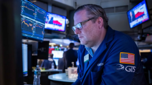 The Dow Jones drops 800 points as AI disruption fears and tariff woes weigh on markets