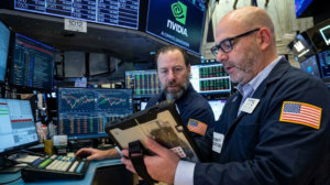 Wall Street Moves Within 0.2% of Record High as Oil Falls Below $100